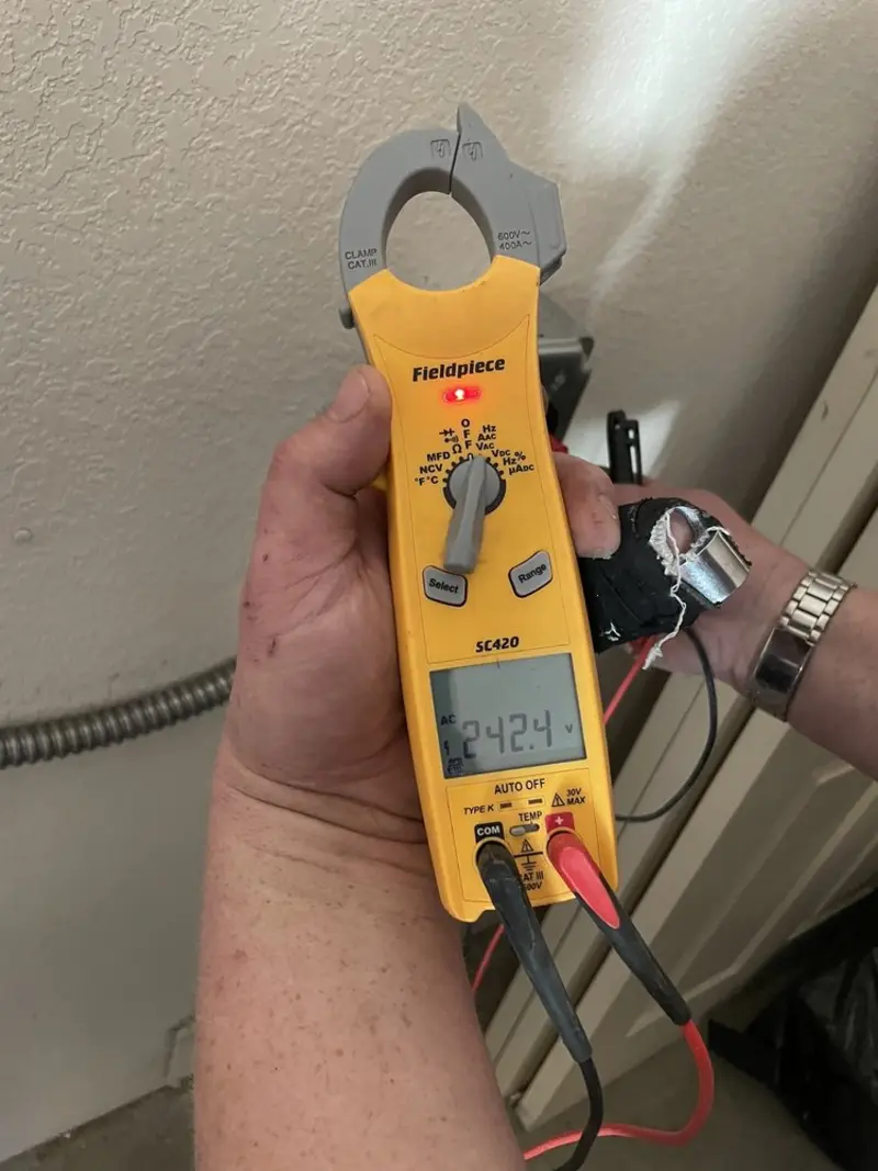 Voltage testing with clamp meter during Generator Installation in Hawthorne